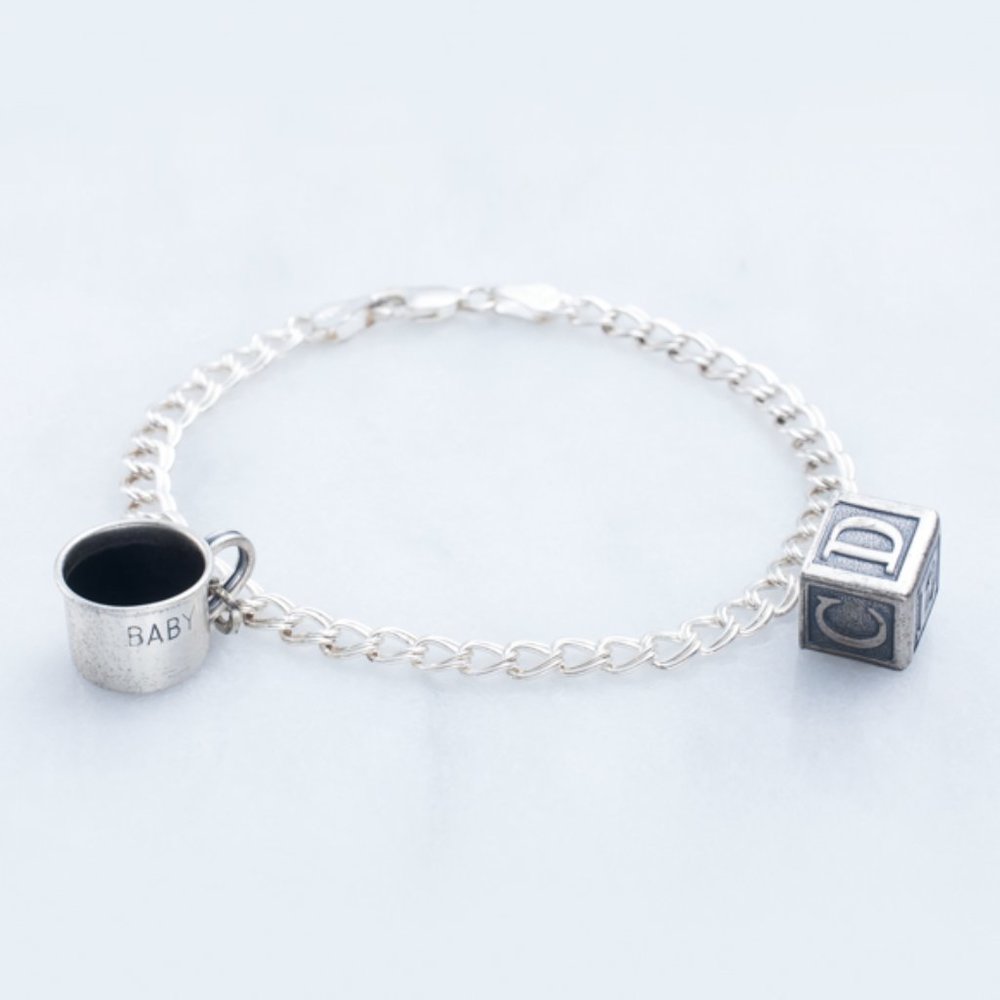 Silver charm bracelet with baby charms - Lot #010